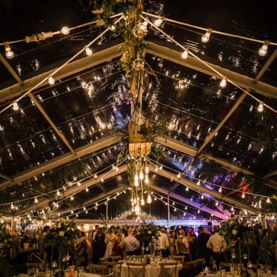 Clearspan marquee interior at night with festoon lights