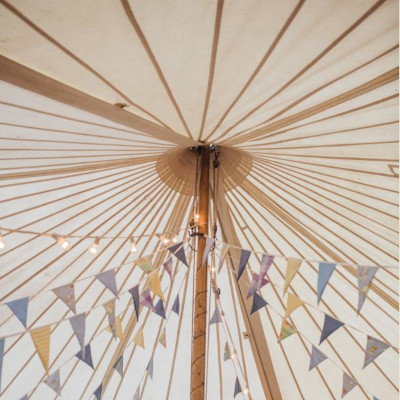 Interior of traditional marquee with bunting