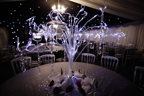 Christmas table decoration for a wedding in a fully lined clearspan marquee