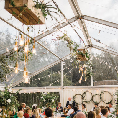 Interior of a clearspan wedding marquee with festoon lighting