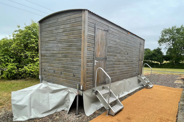 Shepherds Hut wedding toilets with coir matting walkway